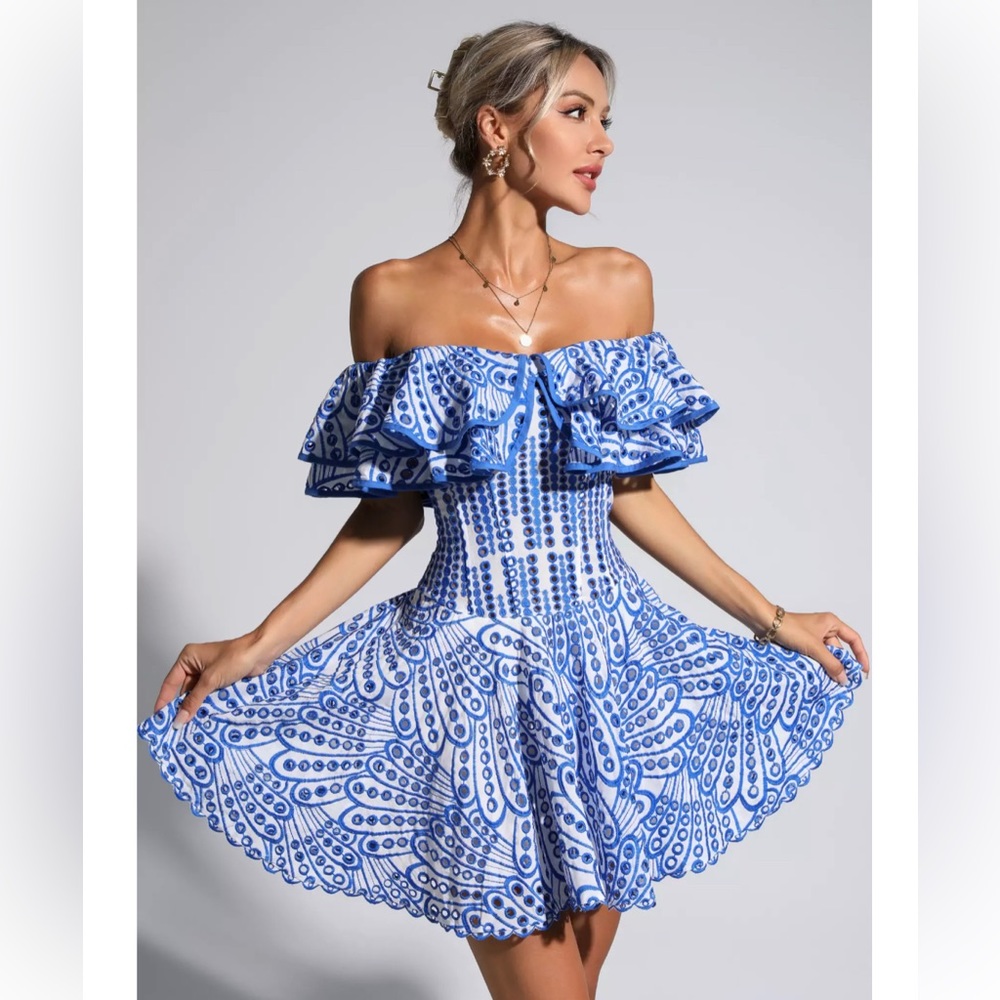Ruffled blue and white mini dress.  Off the shoulder with an open back.